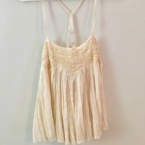 Cream strappy top with embroidery